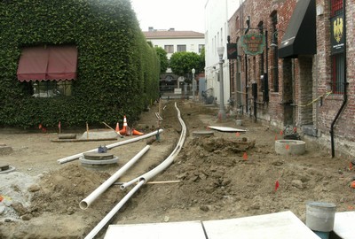 07. Laying pipes under sidewalk